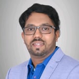 Prasad G